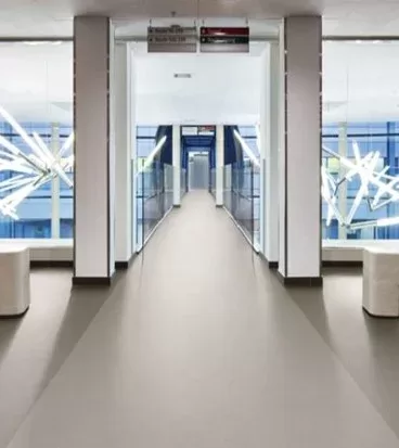 Acoustic vinyl (Resilient Floor Covering),